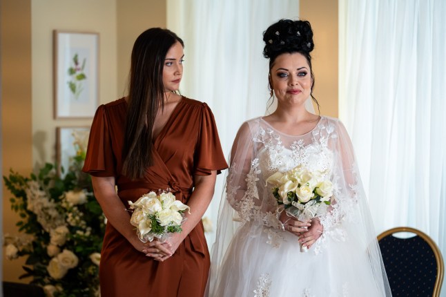 Whitney walks down the aisle with Lauren by her side in EastEnders