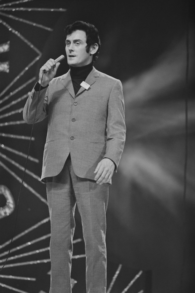 Irish singer Pat McGuigan (1935 - 1987) competing for Ireland at the Eurovision Song Contest (as Pat McGeegan) with the song 'Chance of a Lifetime', Royal Albert Hall London, UK, 6th April 1968. (Photo by Larry Ellis/Daily Express/Getty Images)